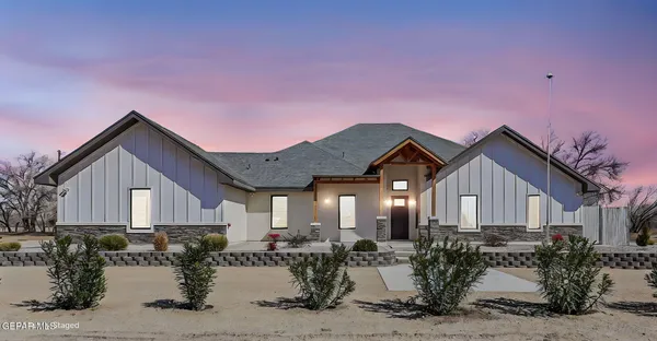 an aerial view of a house with a garden