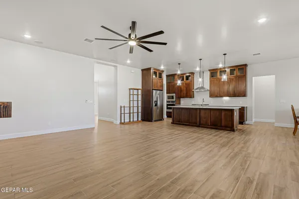 a bedroom with a bed and a potted plant