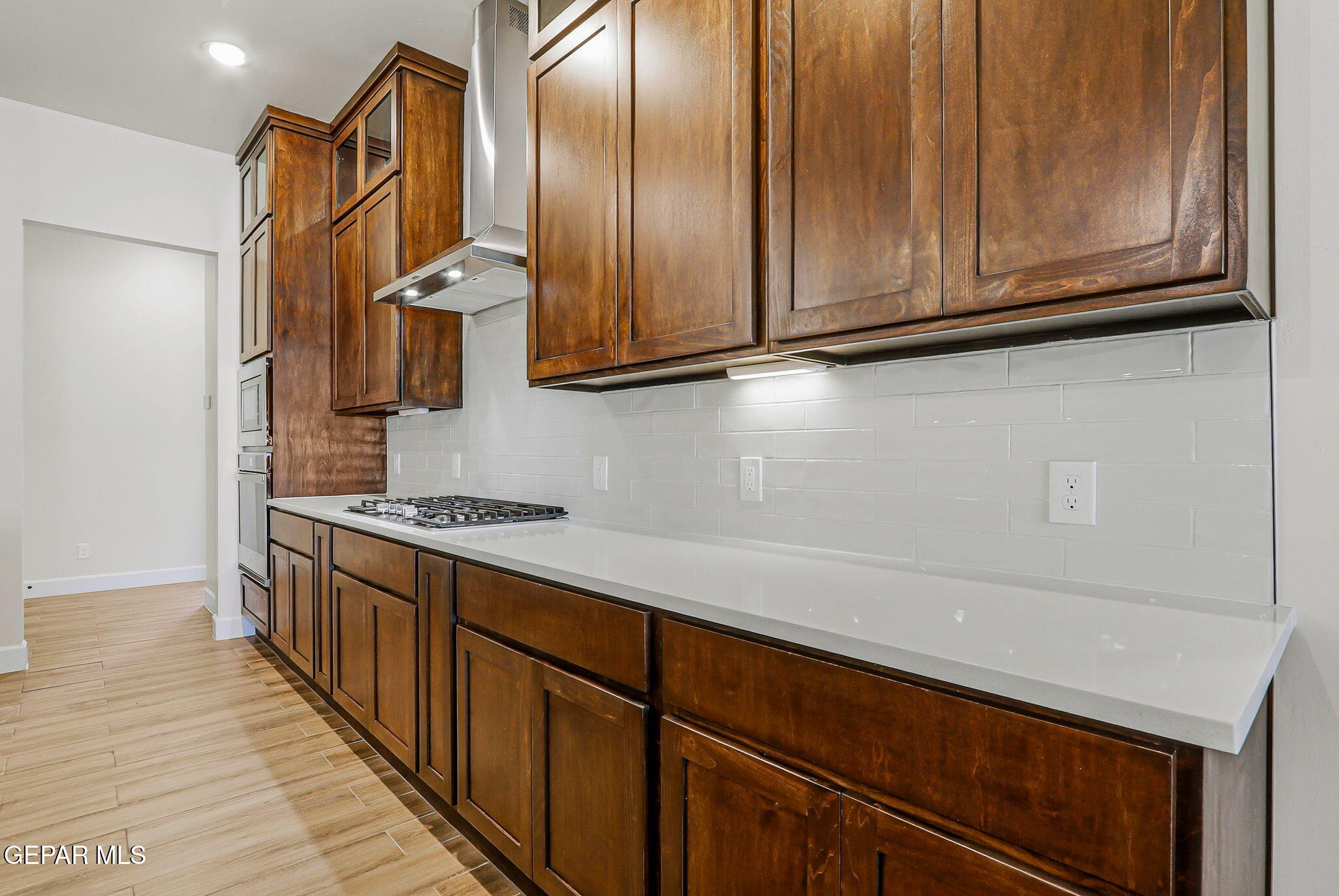 12329 Sugden Road Clint, TX 79836 - Photo 38 of 101 a kitchen with stainless steel appliances granite countertop a stove a sink and a refrigerator