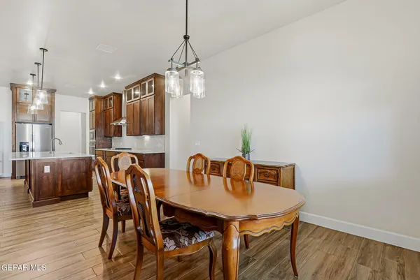 a bathroom with a sink a mirror and vanity