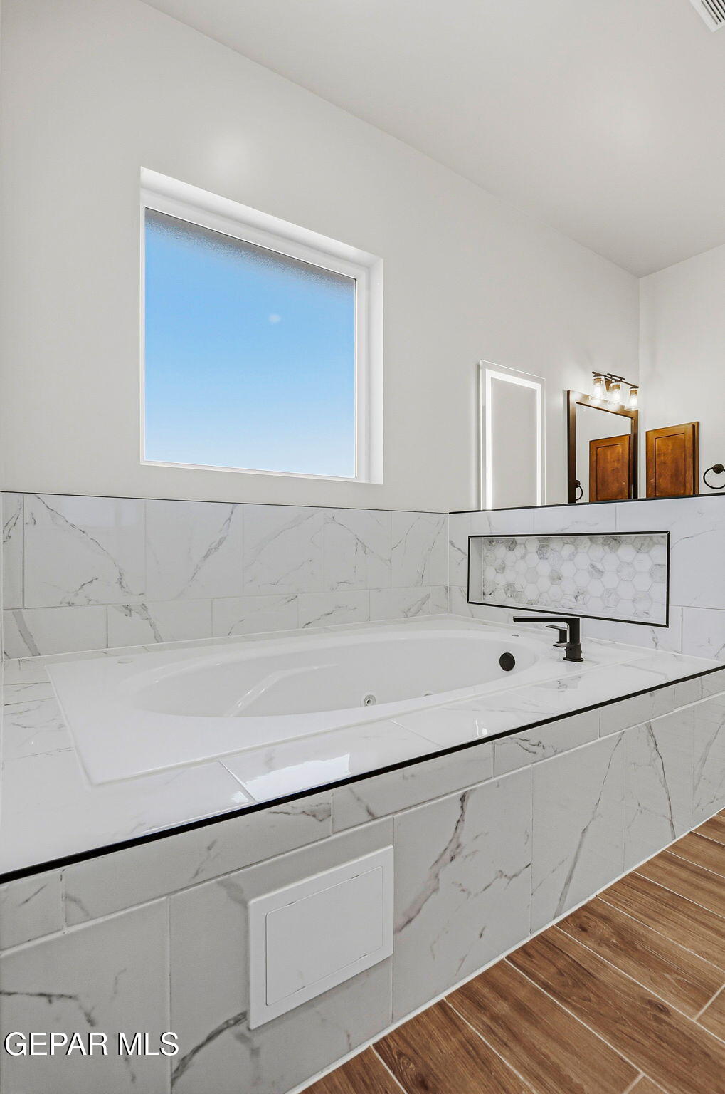 12329 Sugden Road Clint, TX 79836 - Photo 55 of 101 a bathroom with a sink and a mirror