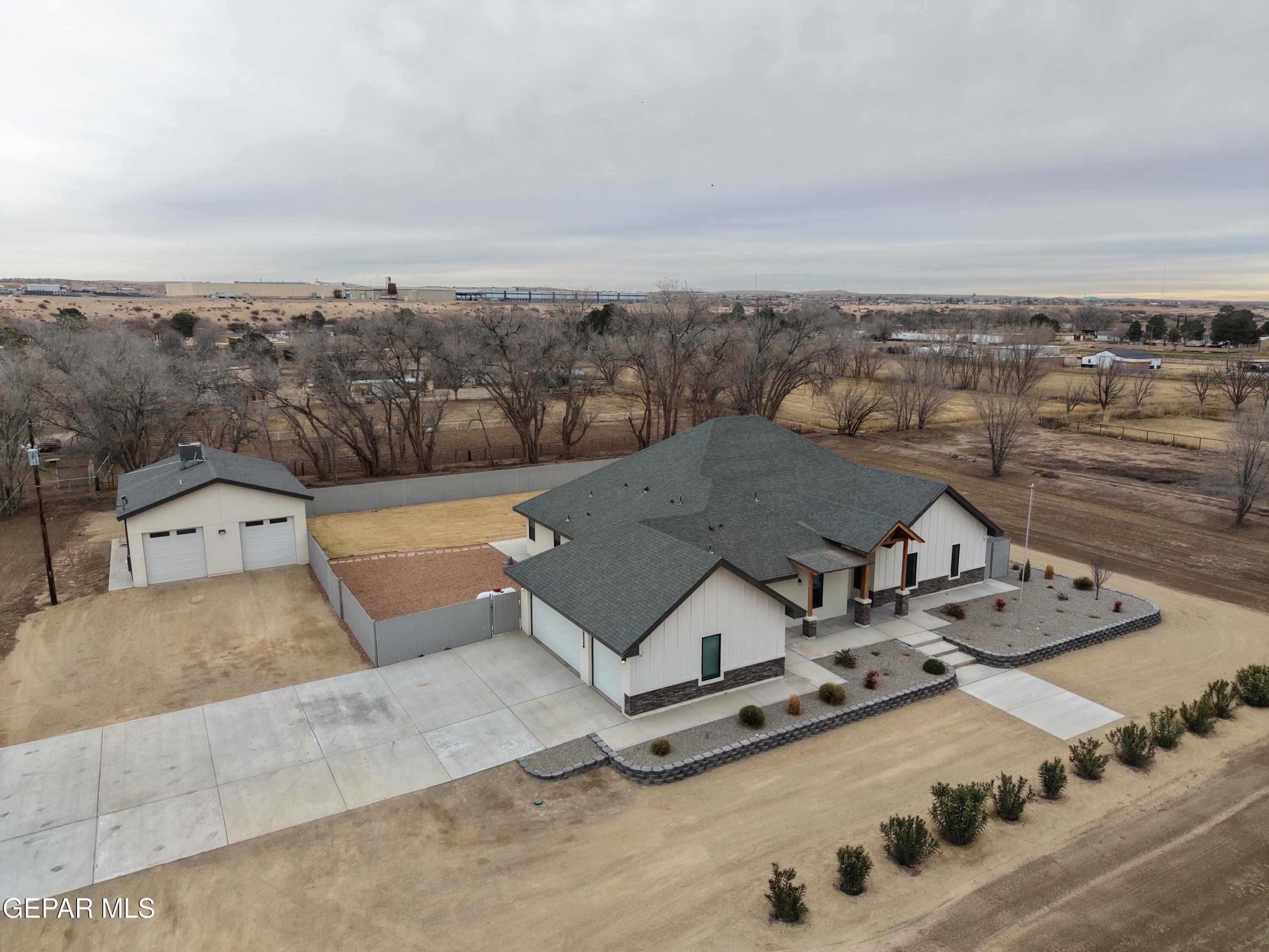 12329 Sugden Road Clint, TX 79836 - Photo 7 of 101 an aerial view of a house with a garden