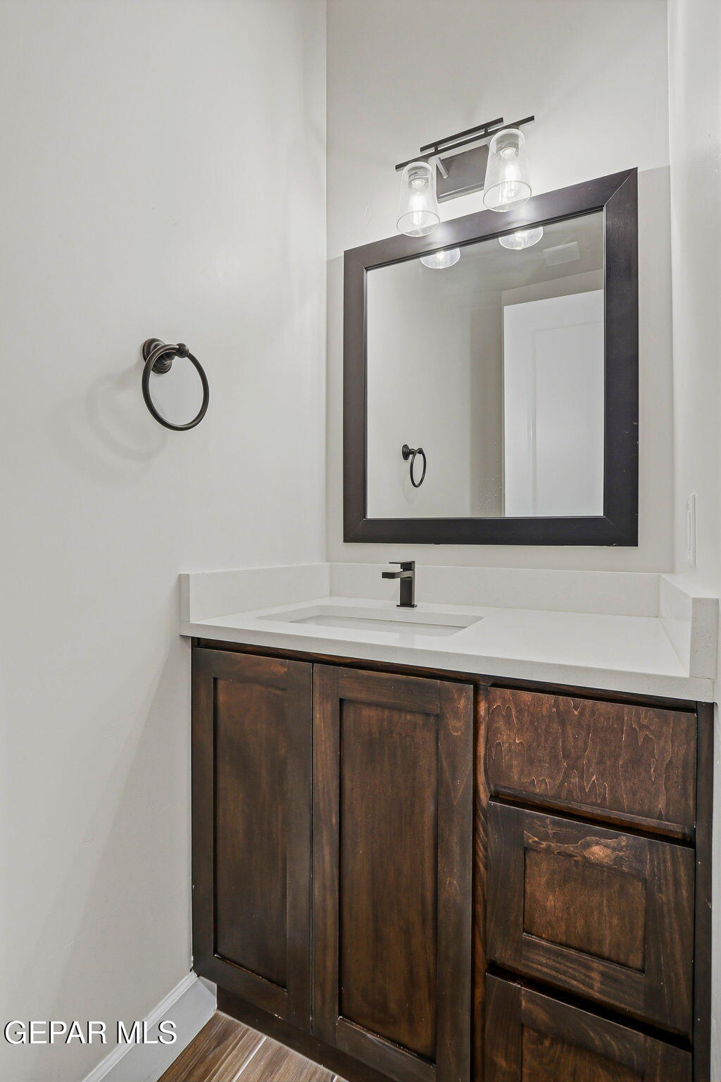 12329 Sugden Road Clint, TX 79836 - Photo 79 of 101 a bathroom with a sink a mirror and vanity
