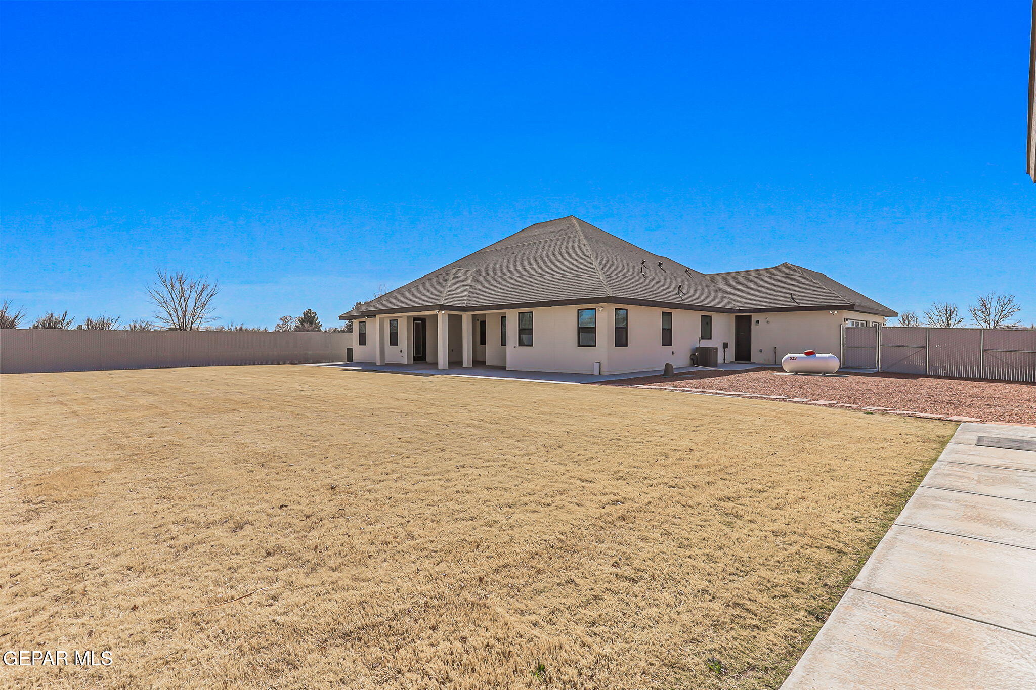 12329 Sugden Road Clint, TX 79836 - Photo 87 of 101 a front view of a house with a yard