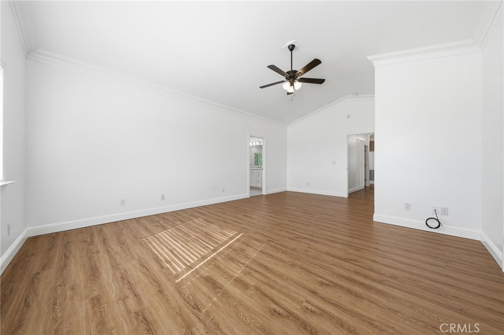 13925 Noble Way Red Bluff, CA 96080 - Photo 20 of 57 a view of empty room with wooden floor