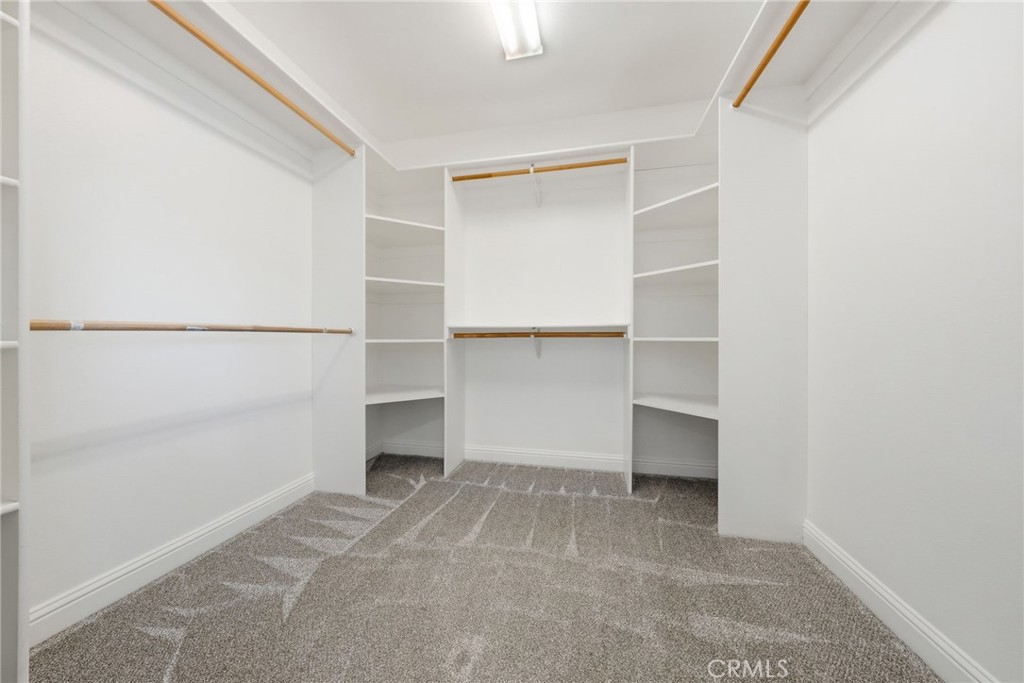 13925 Noble Way Red Bluff, CA 96080 - Photo 23 of 57 a view of an empty walk in closet