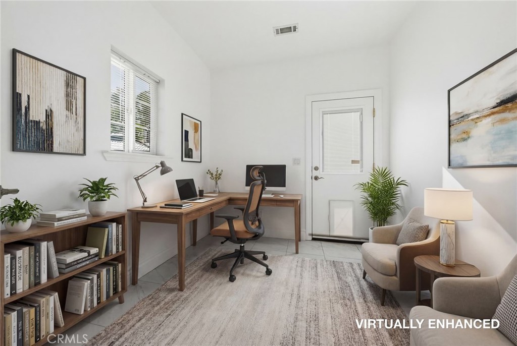 13925 Noble Way Red Bluff, CA 96080 - Photo 30 of 57 a workspace with furniture and a book shelf