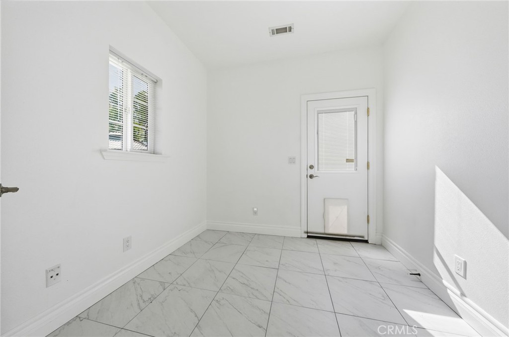 13925 Noble Way Red Bluff, CA 96080 - Photo 31 of 57 an empty room with windows