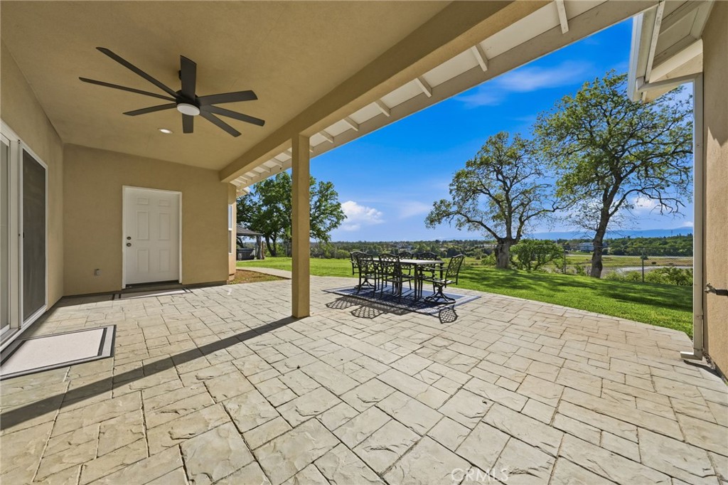 13925 Noble Way Red Bluff, CA 96080 - Photo 32 of 57 a view of a bench and chairs in the patio