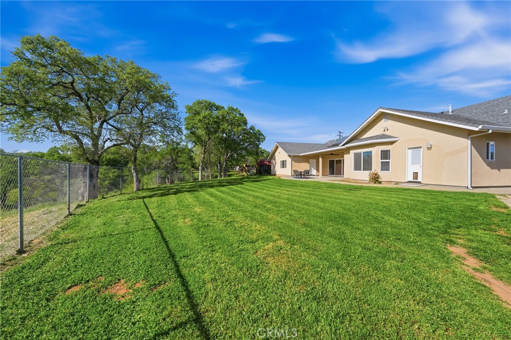 13925 Noble Way Red Bluff, CA 96080 - Photo 42 of 57 a view of house with backyard