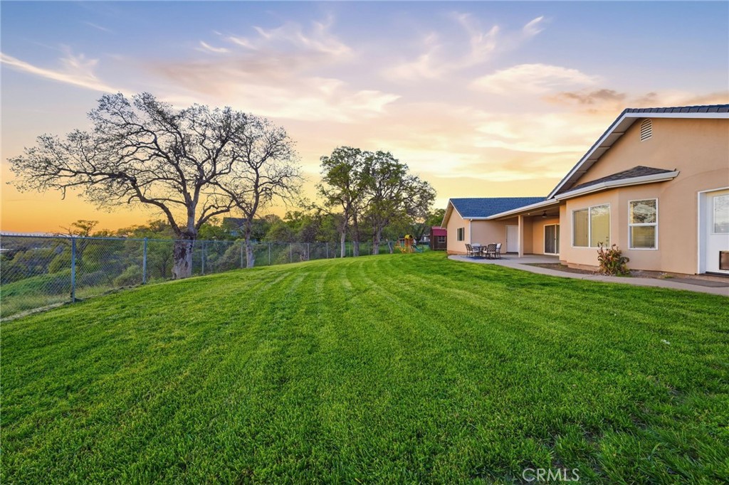 13925 Noble Way Red Bluff, CA 96080 - Photo 43 of 57 a view of a house with backyard and garden