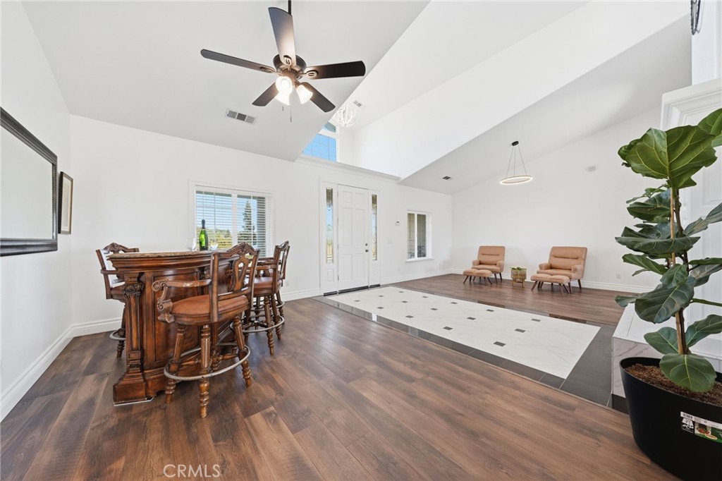 13925 Noble Way Red Bluff, CA 96080 - Photo 5 of 57 a view of a workspace with furniture and wooden floor