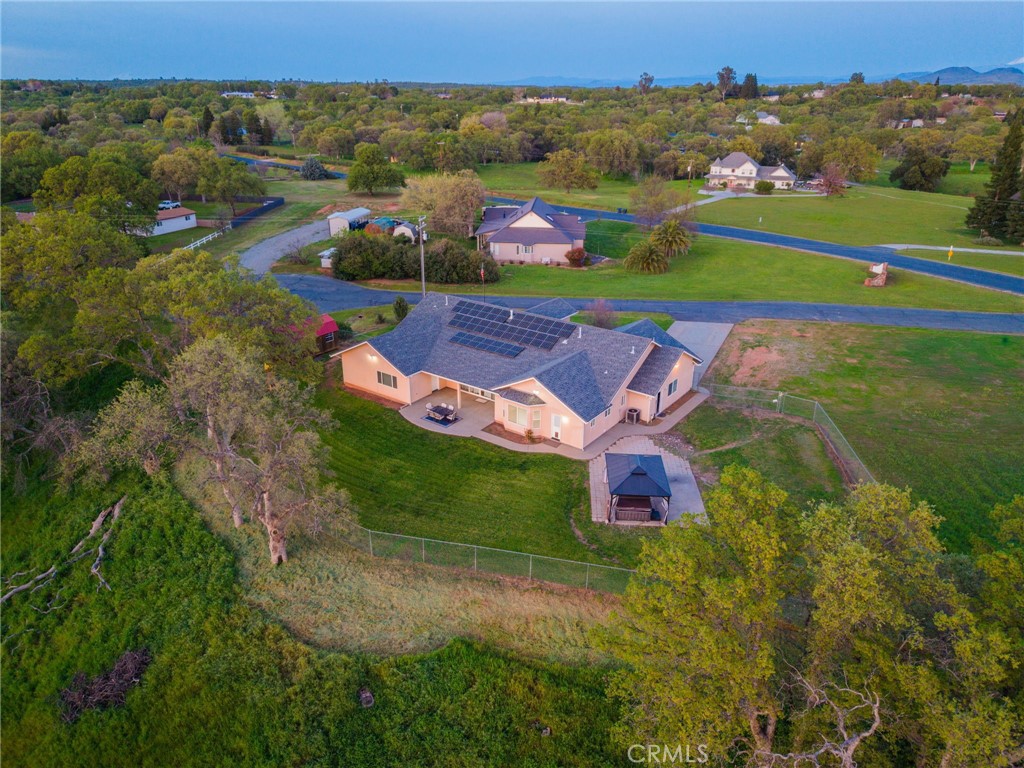 13925 Noble Way Red Bluff, CA 96080 - Photo 51 of 57 an aerial view of a house with a garden