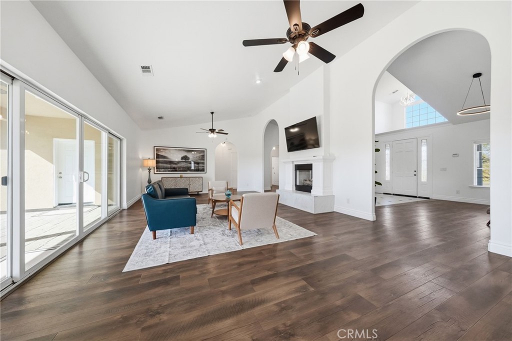 13925 Noble Way Red Bluff, CA 96080 - Photo 9 of 57 a living room with furniture and a wooden floor