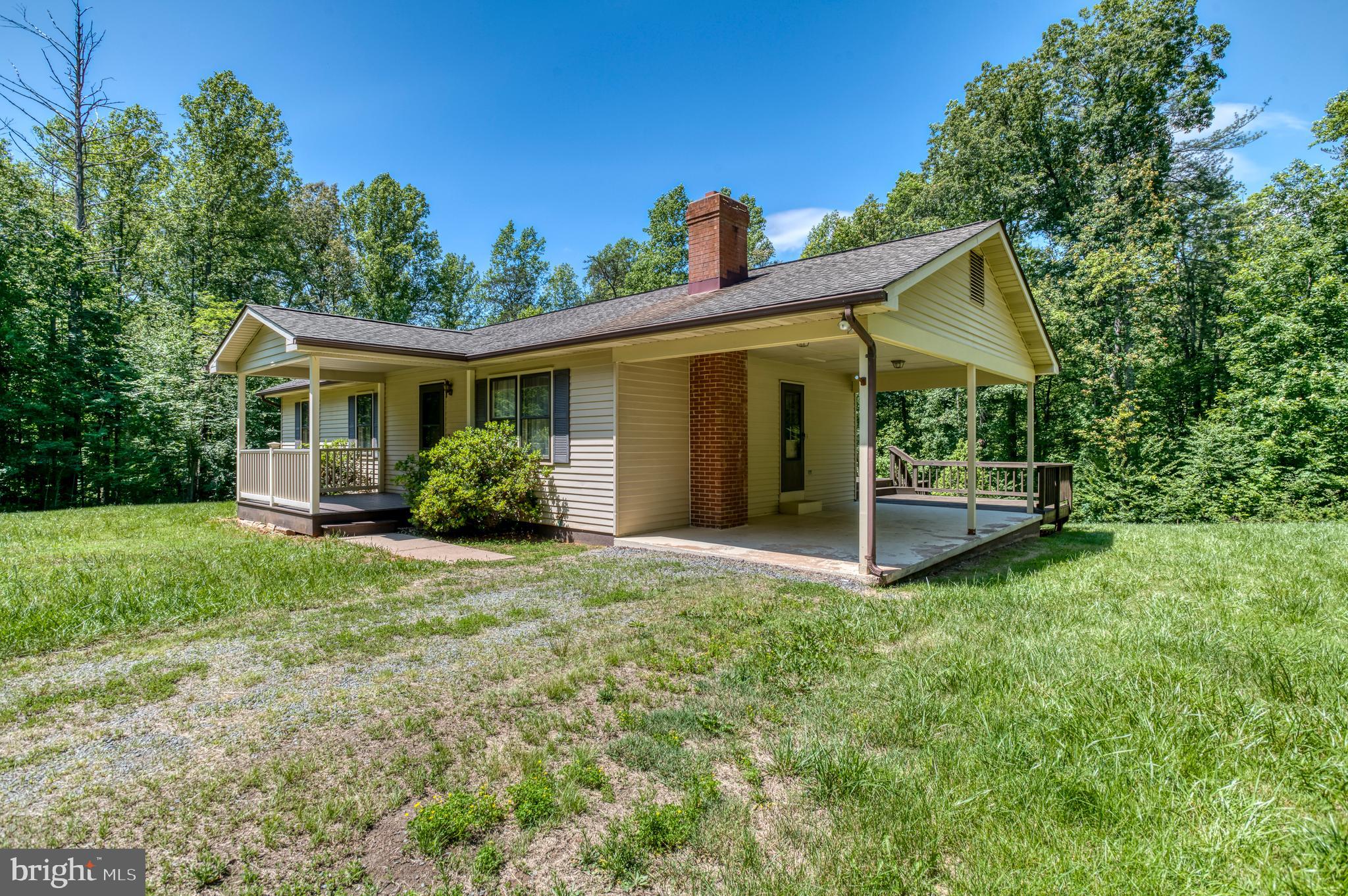 803 Weaver Hollow Road Banco, VA 22711 - Photo 26 of 67 a view of a house with backyard and garden