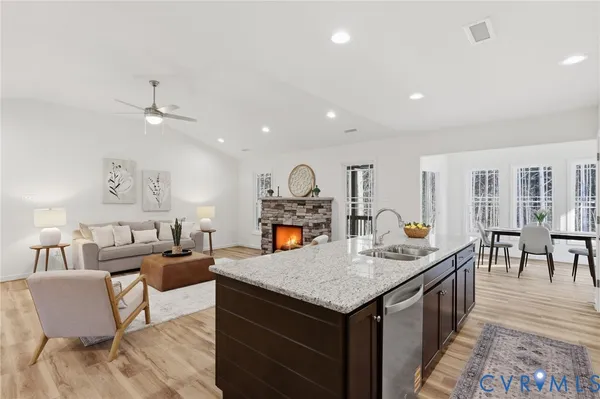 an empty room with fan and ceiling fan