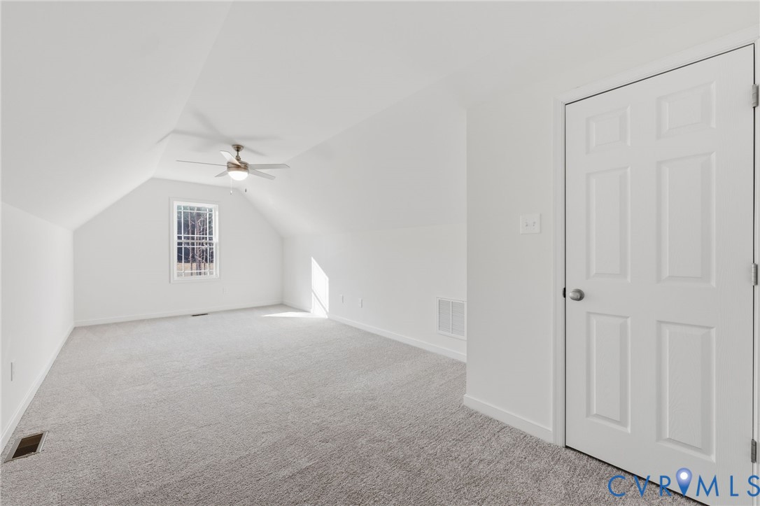2214 Walnut Tree Boulevard Powhatan, VA 23139 - Photo 27 of 30 a view of a livingroom with a staircase