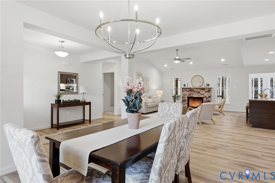 2214 Walnut Tree Boulevard Powhatan, VA 23139 - Photo 8 of 30 a view of a dining room with furniture