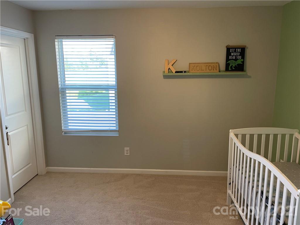 13026 Hill Pine Road, Unit 6 Midland, NC 28107 - Photo 19 of 37 a view of an empty room with a window