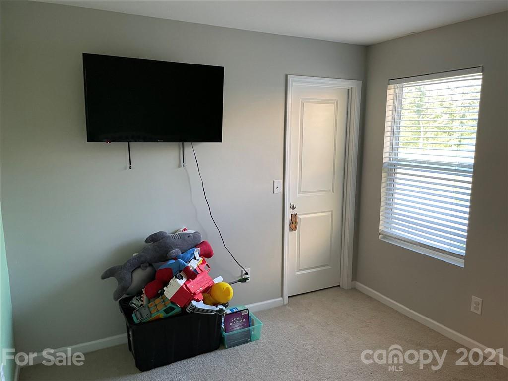 13026 Hill Pine Road, Unit 6 Midland, NC 28107 - Photo 20 of 37 a room with toys and a window