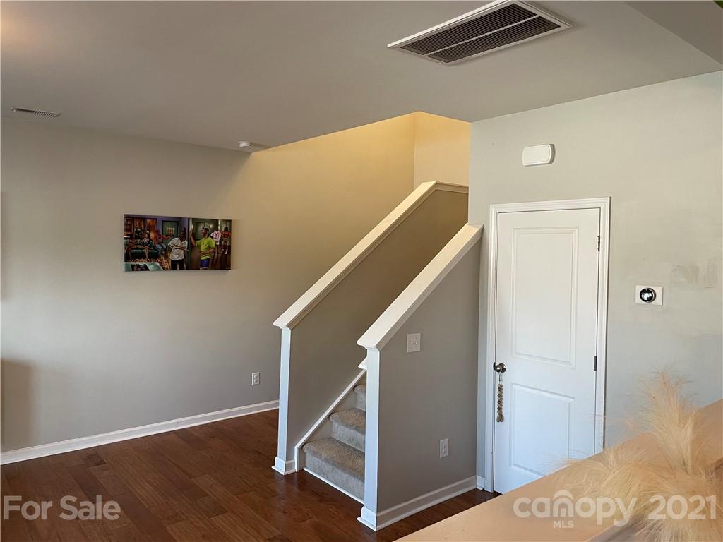13026 Hill Pine Road, Unit 6 Midland, NC 28107 - Photo 3 of 37 a view of a hallway with staircase