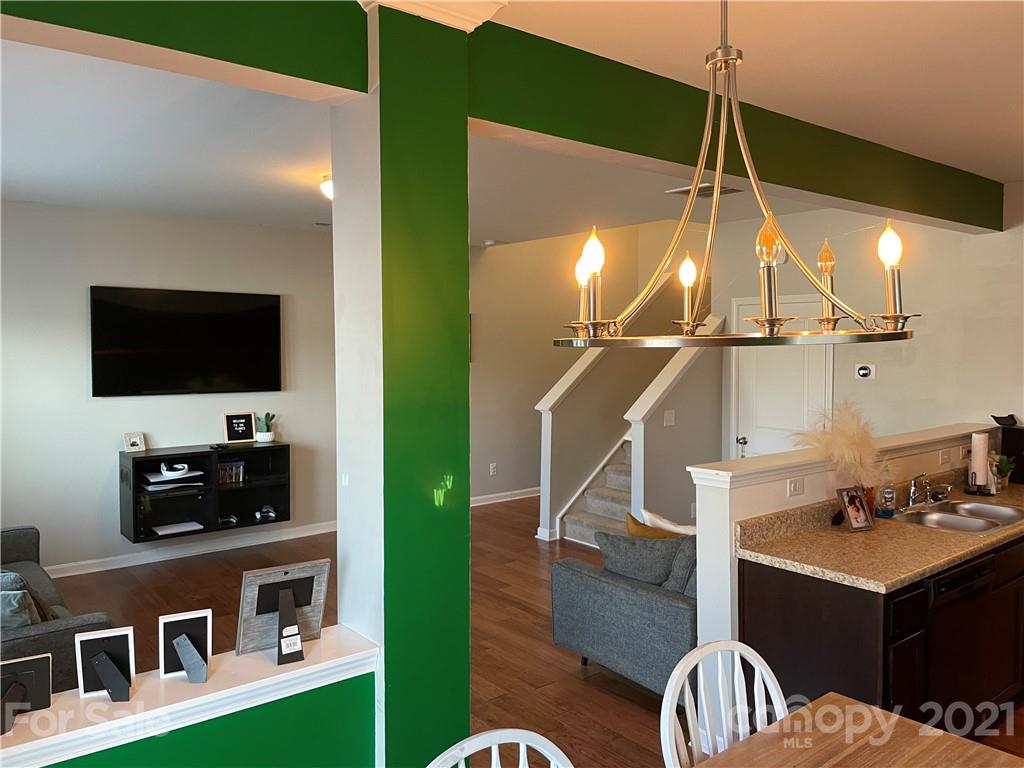 13026 Hill Pine Road, Unit 6 Midland, NC 28107 - Photo 10 of 37 a room with furniture and flat screen tv