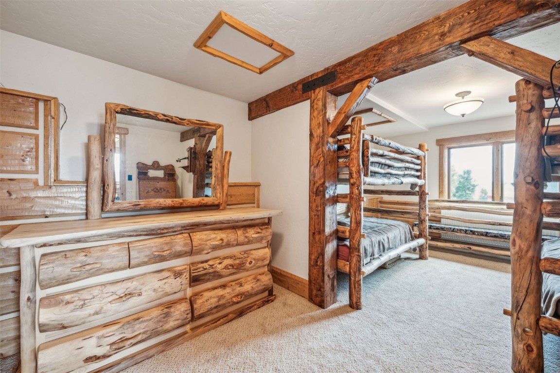 733 Spring Creek Ranch Road Silverthorne, CO 80498 - Photo 20 of 37 a view of room with stairs and a window