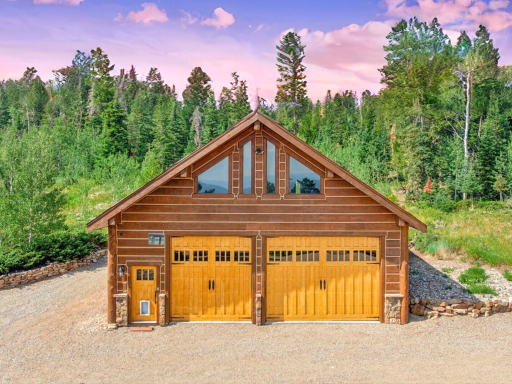 733 Spring Creek Ranch Road Silverthorne, CO 80498 - Photo 25 of 37 a view of a house with a yard