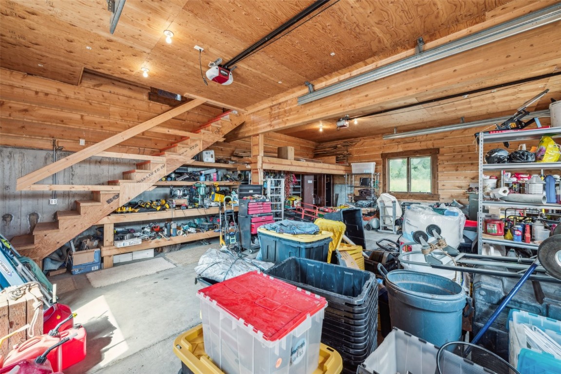733 Spring Creek Ranch Road Silverthorne, CO 80498 - Photo 27 of 37 a living room with lots of furniture and clutter