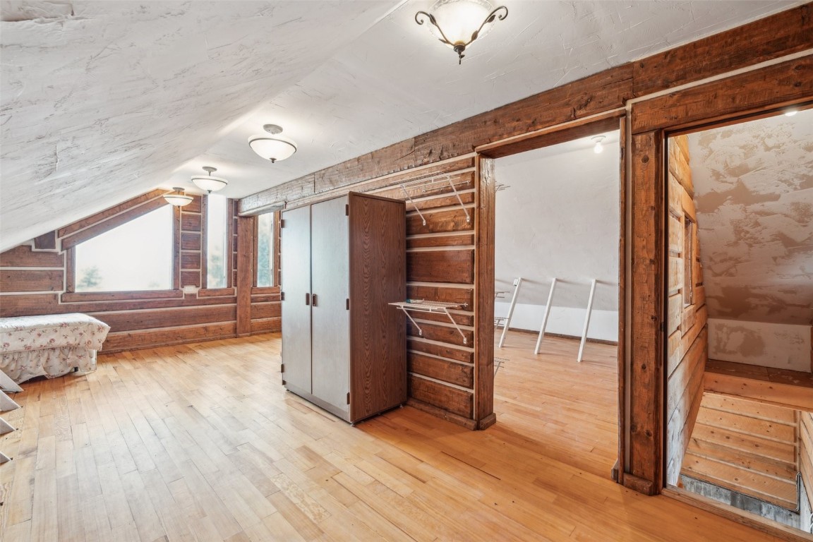 733 Spring Creek Ranch Road Silverthorne, CO 80498 - Photo 28 of 37 a view of a hallway with wooden floor and cabinet