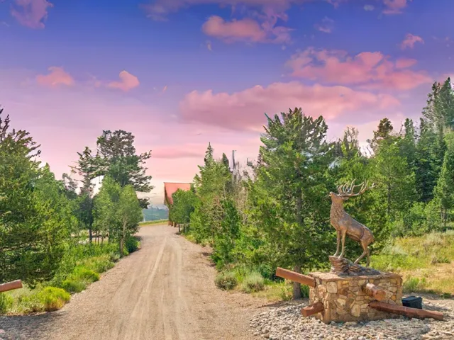 a view of a street with a building in the background