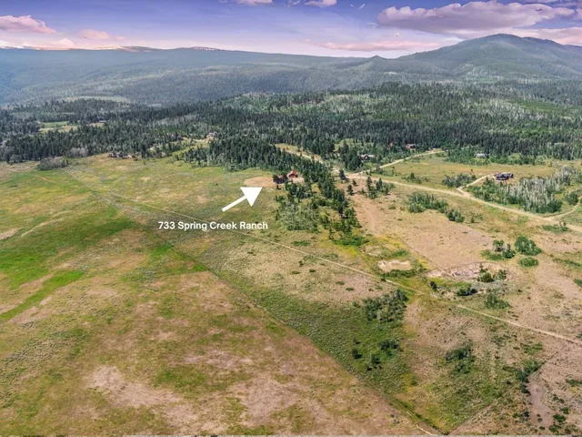 a view of a lake with mountains in the background