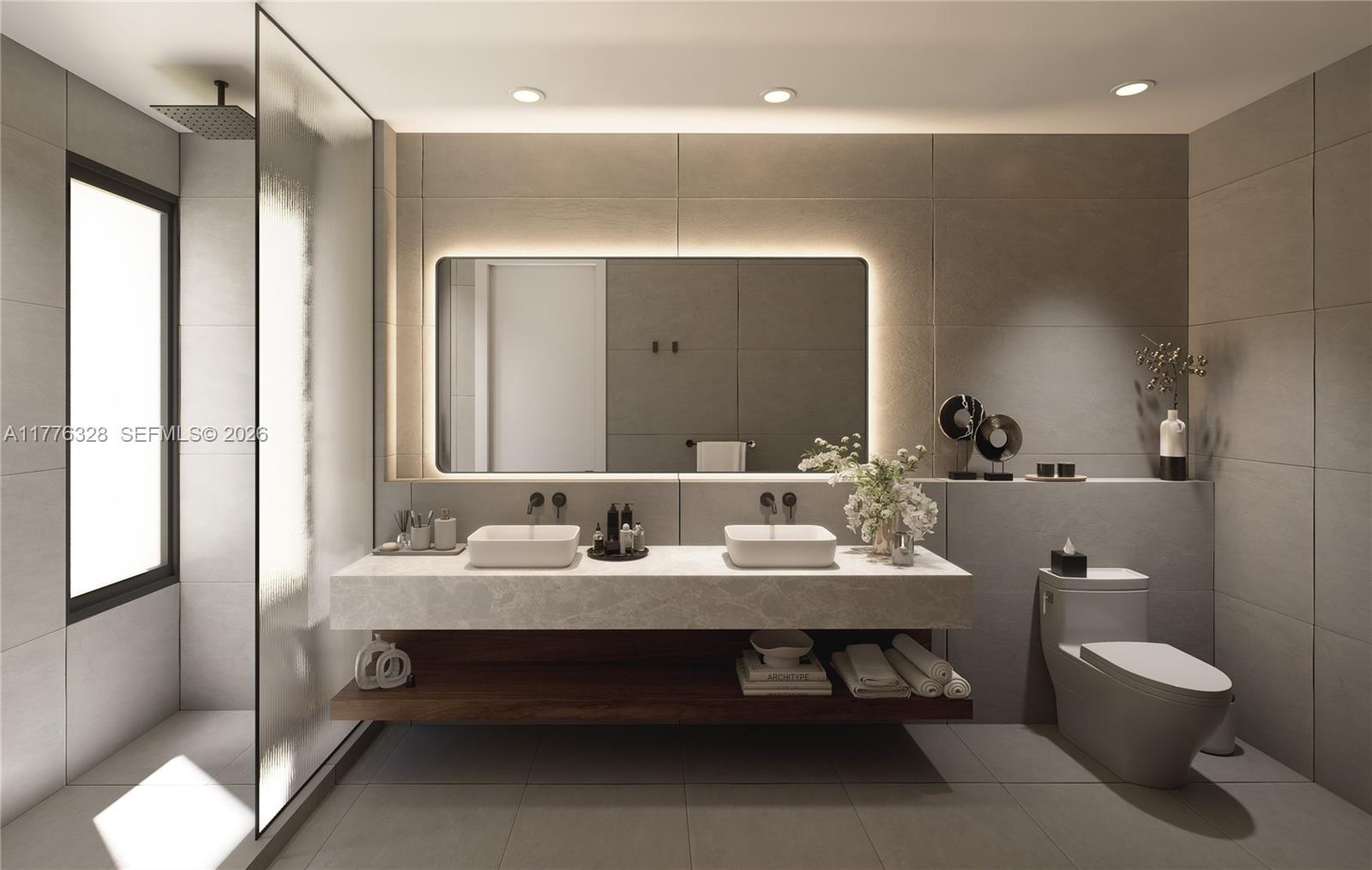 984 Southwest 10th Street, Unit 1 Miami, FL 33130 - Photo 7 of 12 a bathroom with a toilet sink and mirror