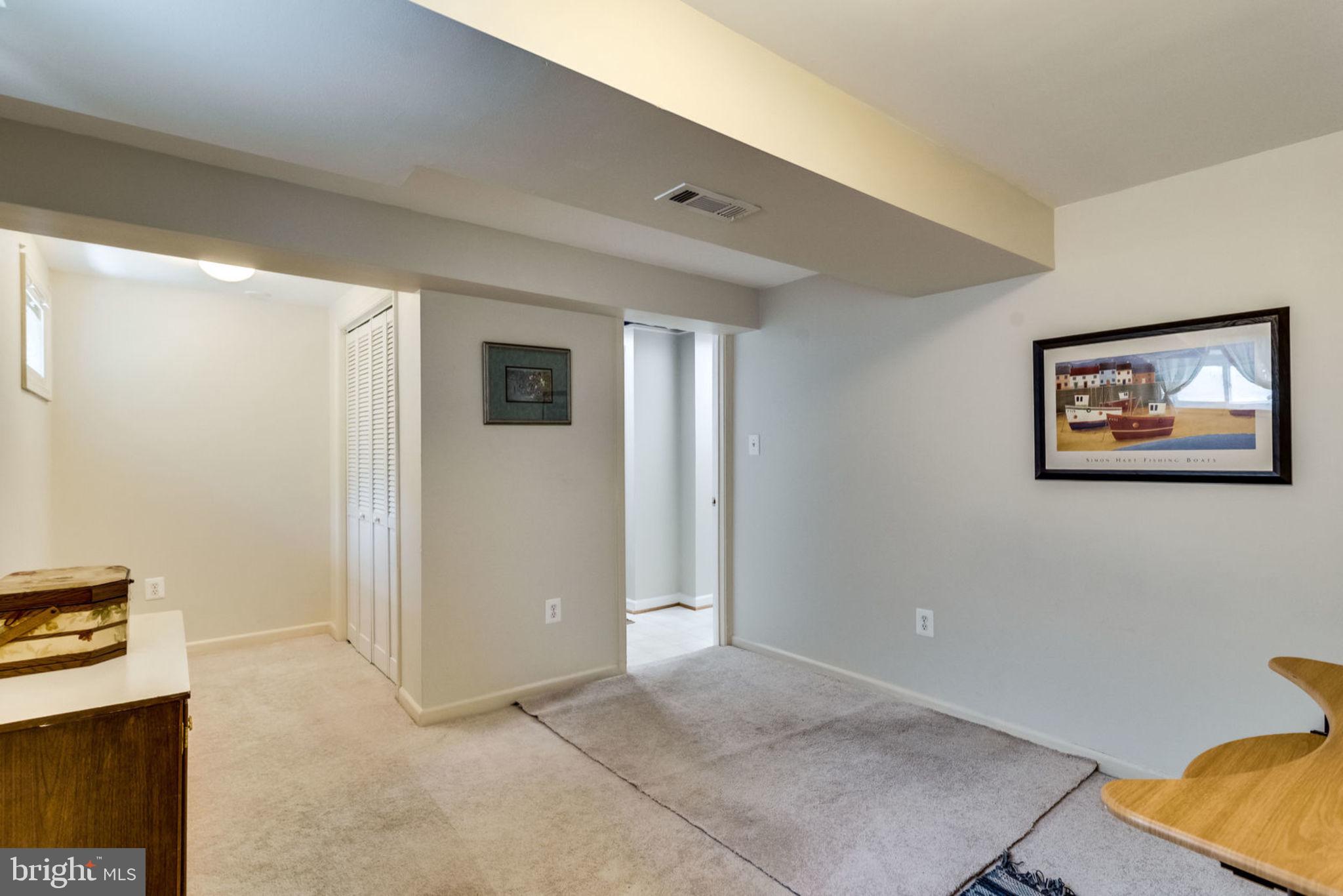 7700 Hayfield Road Alexandria, VA 22315 - Photo 45 of 58 Lower level 6th bed/den with closet