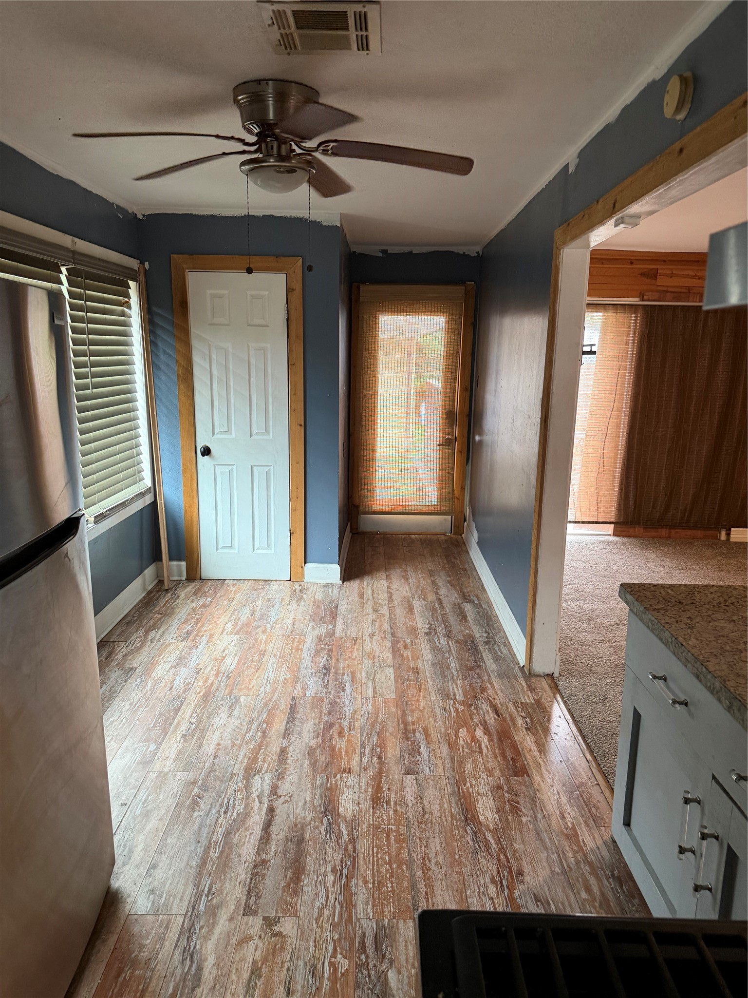 6811 St Augustine Street Houston, TX 77021 - Photo 17 of 20 a view of a kitchen from a hallway