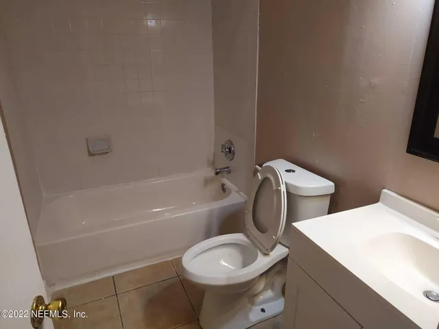 a view of a small space with a fan