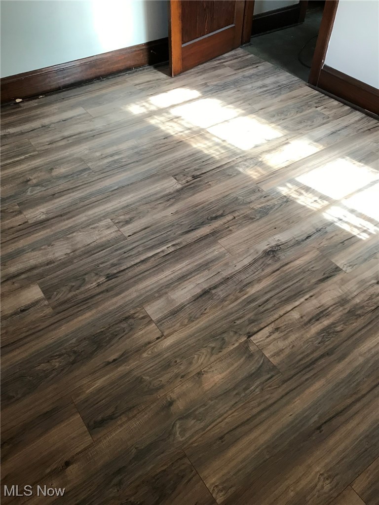 720 Kipling Street Akron, OH 44306 - Photo 13 of 21 Room details with baseboards and wood finished floors