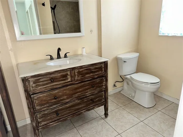 a bathroom with a sink and a toilet