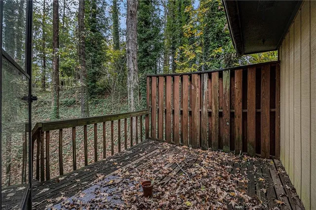 a view of a wooden fence
