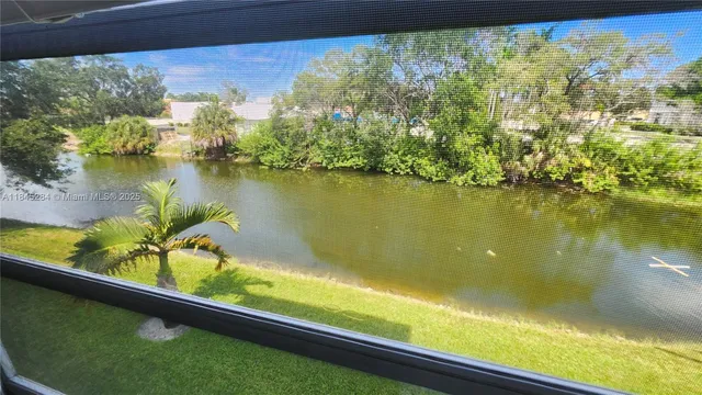 a view of a lake from a balcony