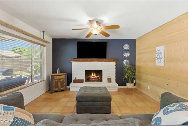 a bedroom with a bed and a desk