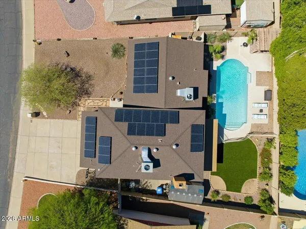 a front view of a house with yard