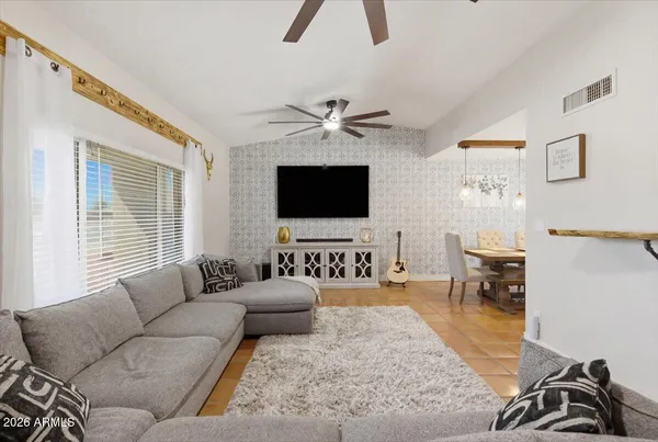 a aerial view of multiple houses with yard