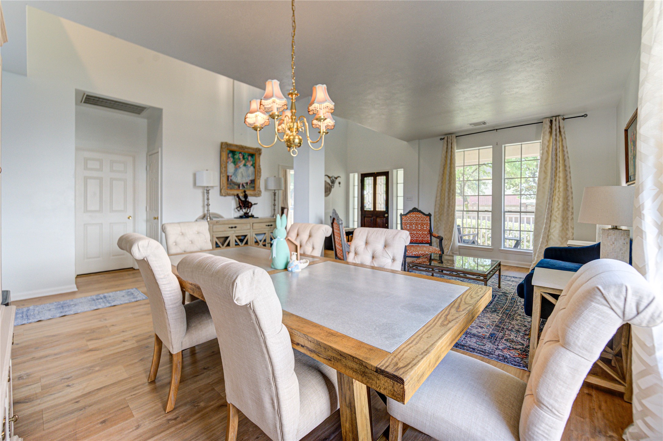 10906 Trail Ridge Drive Houston, TX 77064 - Photo 7 of 41 Formal dining area seamlessly connected to the formal living room, ideal for entertaining and gatherings.