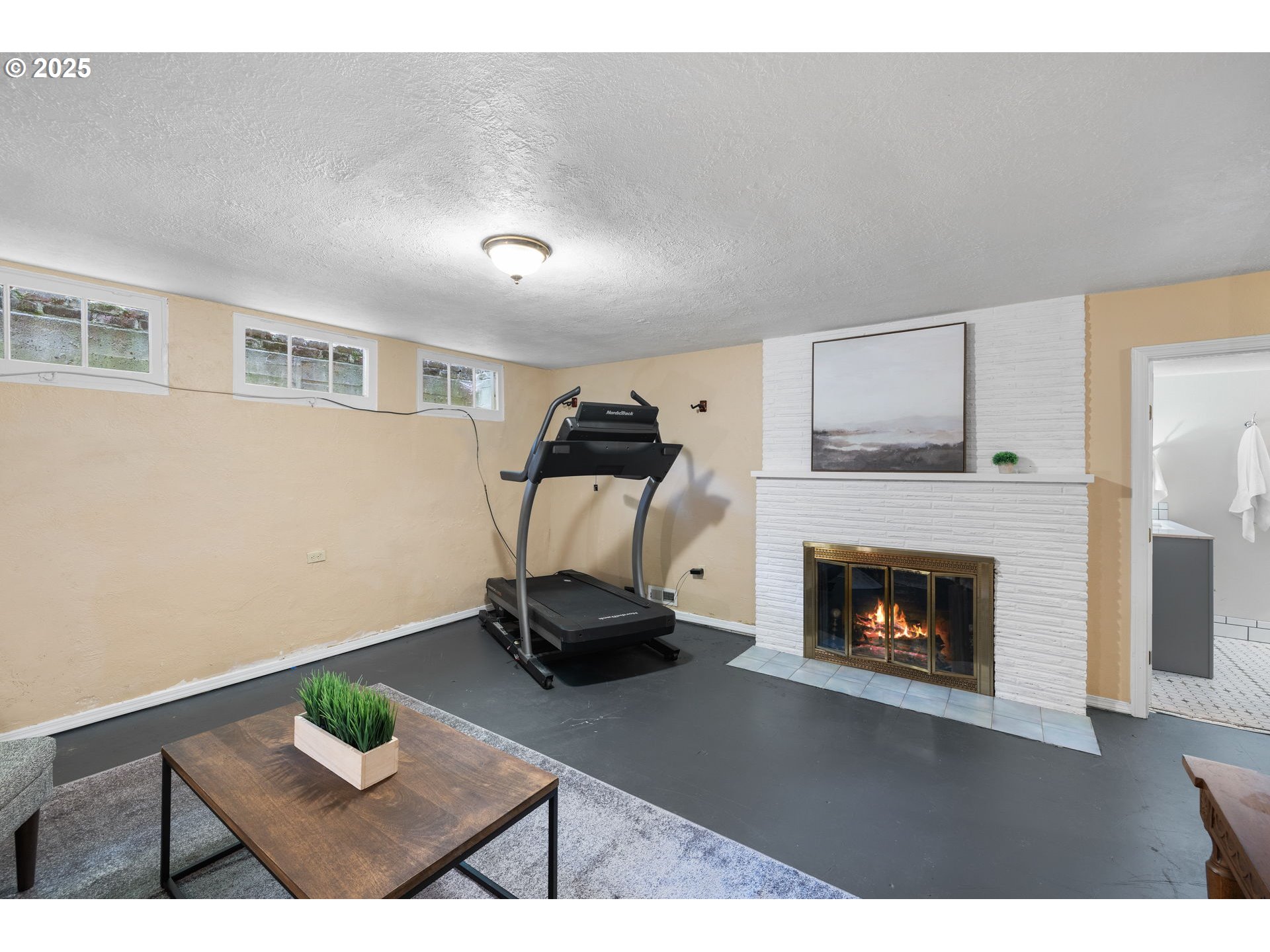 632 Northeast Everett Street Camas, WA 98607 - Photo 33 of 47 a living room with furniture and a fireplace