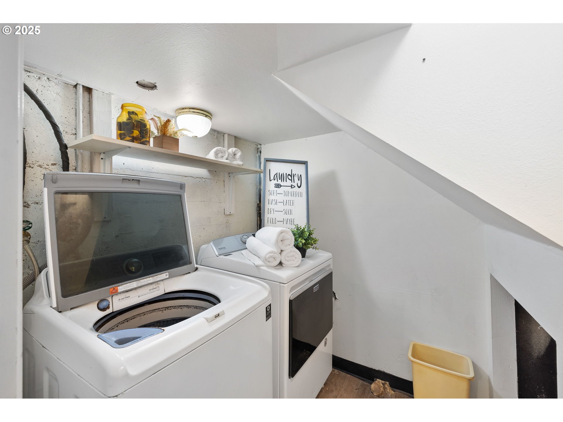 632 Northeast Everett Street Camas, WA 98607 - Photo 34 of 47 a living room with furniture and flat screen tv
