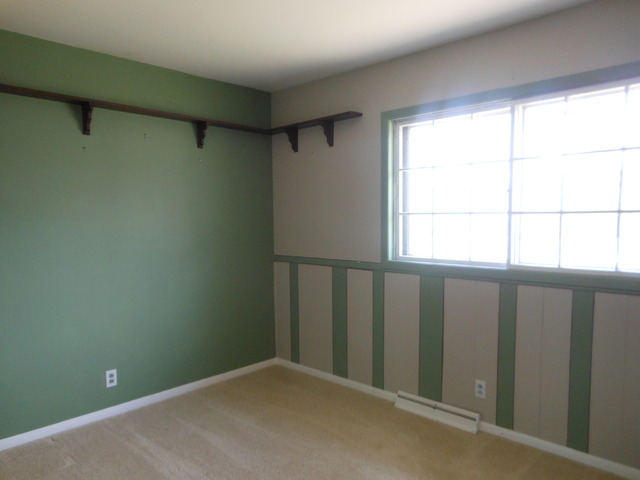 111 Perth Road Cary, IL 60013 - Photo 5 of 6 a view of an empty room with a window