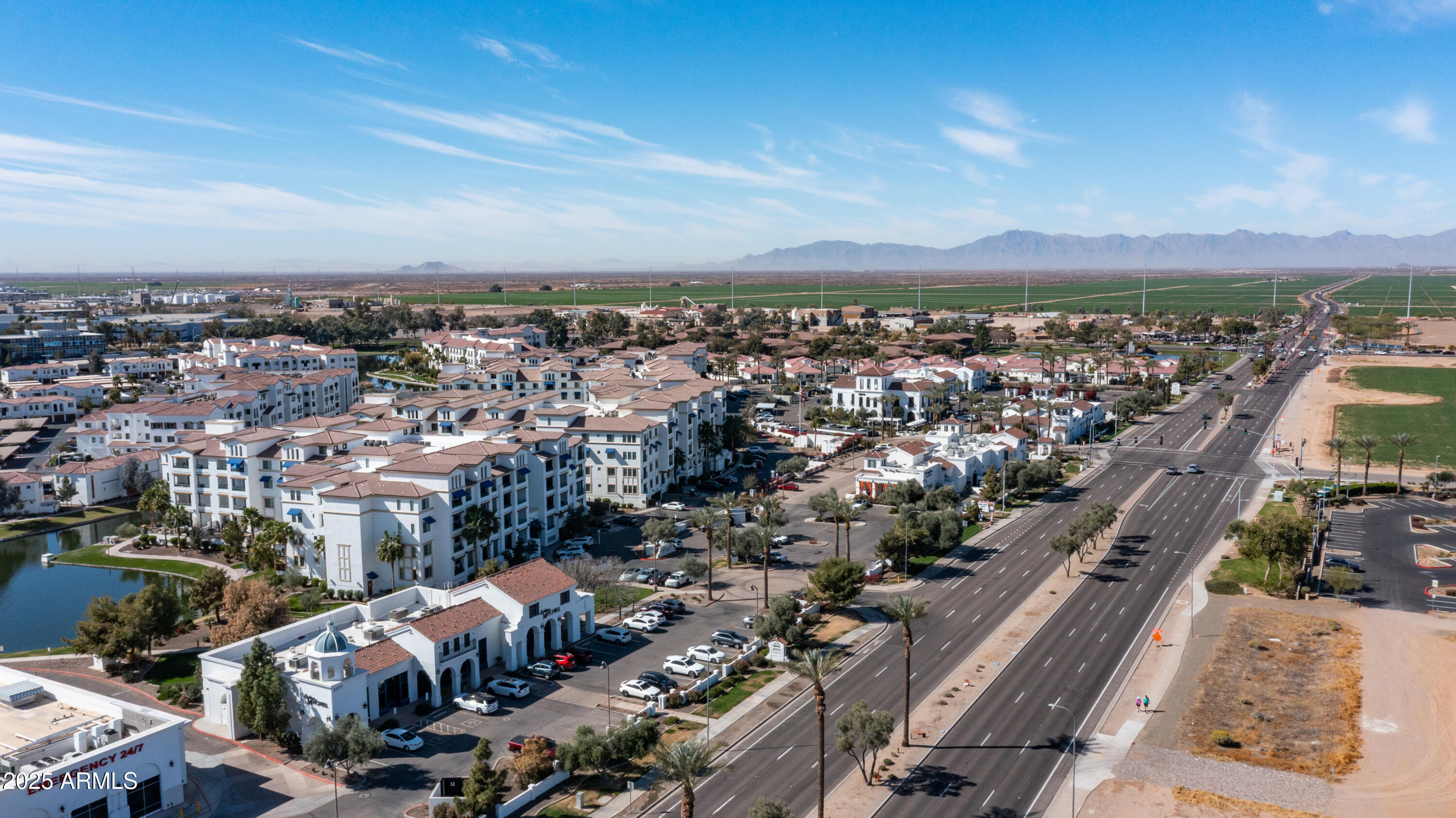 2511 West Queen Creek Road, Unit 166 Chandler, AZ 85248 - Photo 45 of 66 an aerial view of a city with lots of residential buildings