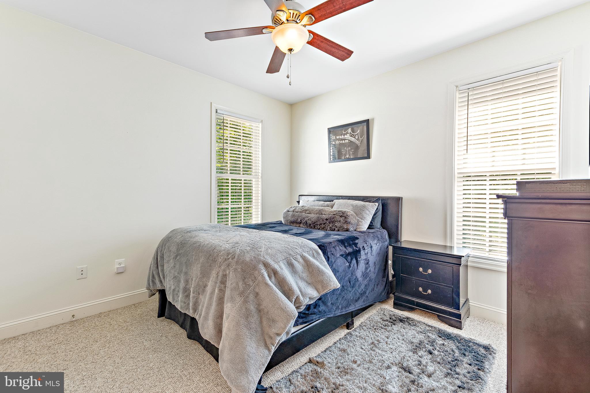 1808 Wilson Road Huntingtown, MD 20639 - Photo 34 of 53 a bedroom with a bed and a window