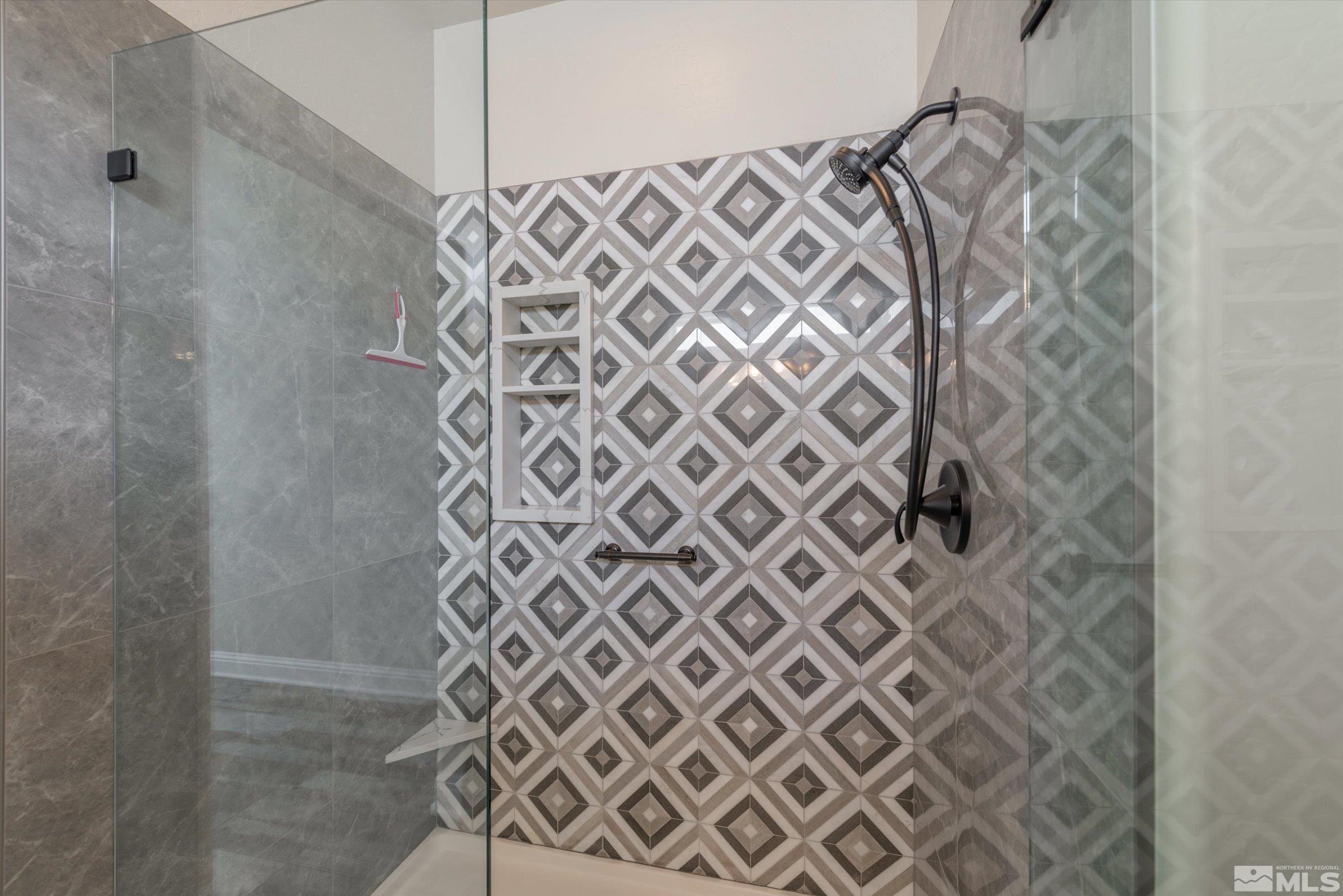9125 Heritage Ridge Court Reno, NV 89523 - Photo 17 of 40 a bathroom with a shower